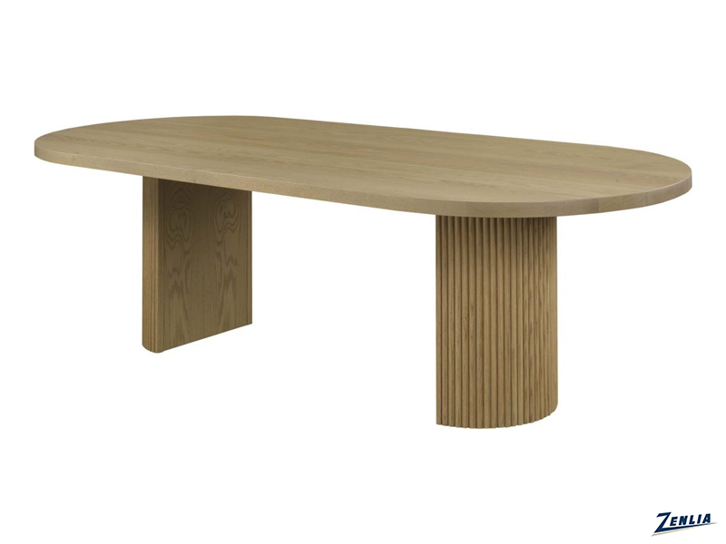A wooden dining table with an oval top and two distinct pedestal legs, one smooth and the other ribbed, set against a plain white background.