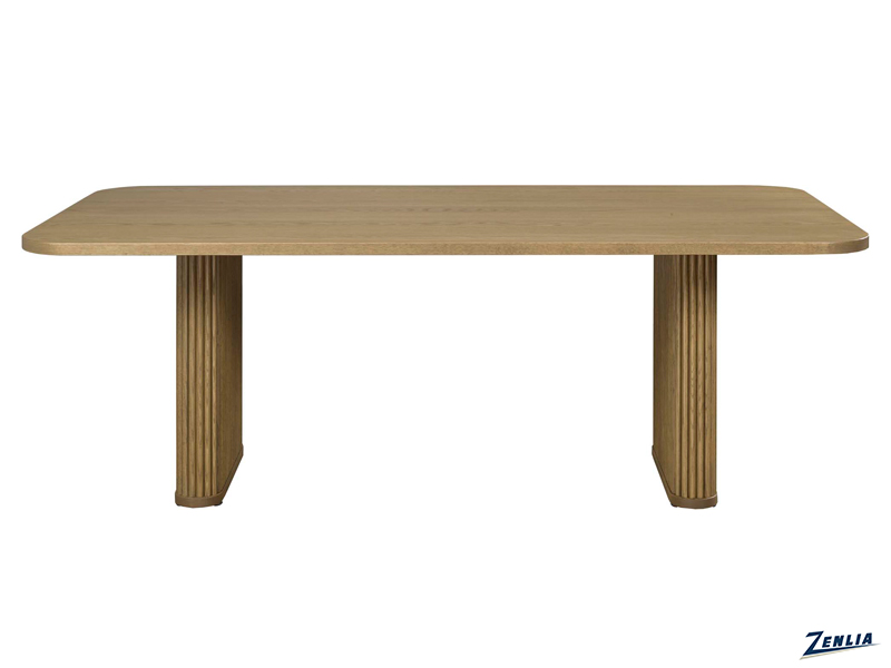A rectangular wooden dining table with a smooth surface and rounded edges, supported by two fluted, column-like legs, set against a plain white background.